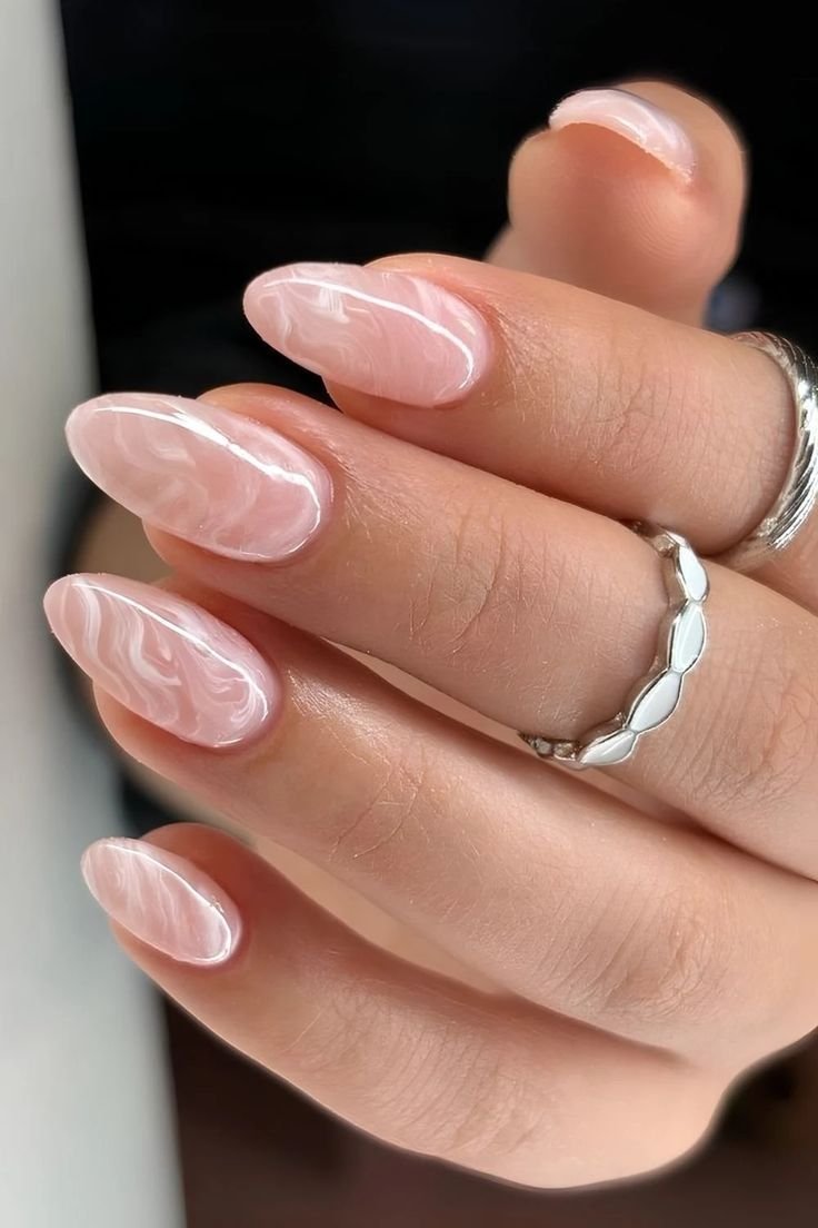 18 Unique Nail Art Designs That Will Make You the Star of the Show (Check Out #9!) - 3. Swirly Marble