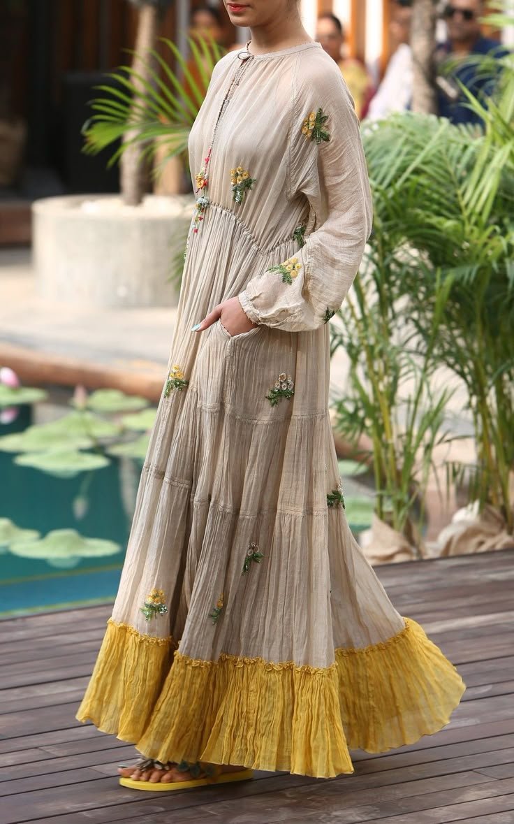 20 Ethnic Maxi Dresses That Bring Vintage Charm to Modern Fashion! - Soft Cream and Floral Embroidery
