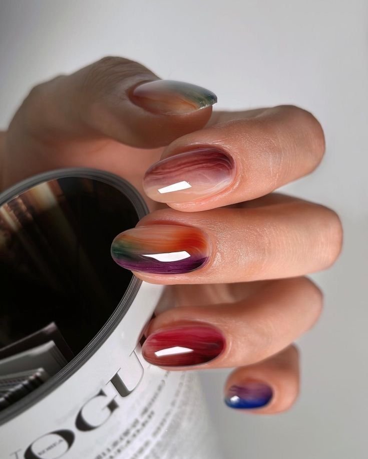 24 Glam Christmas Nail Designs That’ll Make You Shine Bright This Season! - 17. Bright and Bold Jewel Tones 1