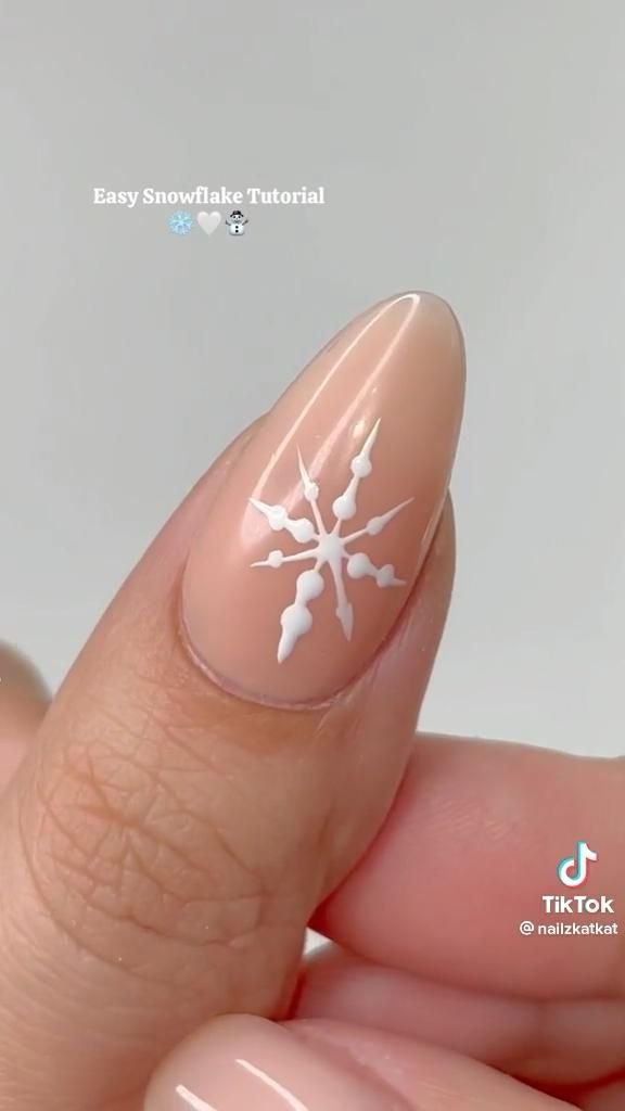 24 Glam Christmas Nail Designs That’ll Make You Shine Bright This Season! - 2. Frosty Snowflakes 1