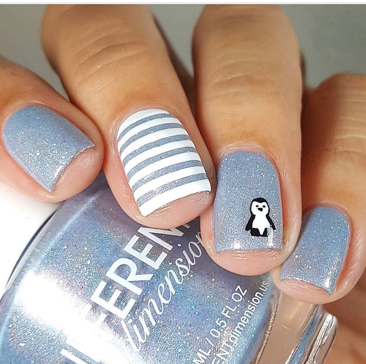 24 Glam Christmas Nail Designs That’ll Make You Shine Bright This Season! - 22. Cute Penguin Nails 1