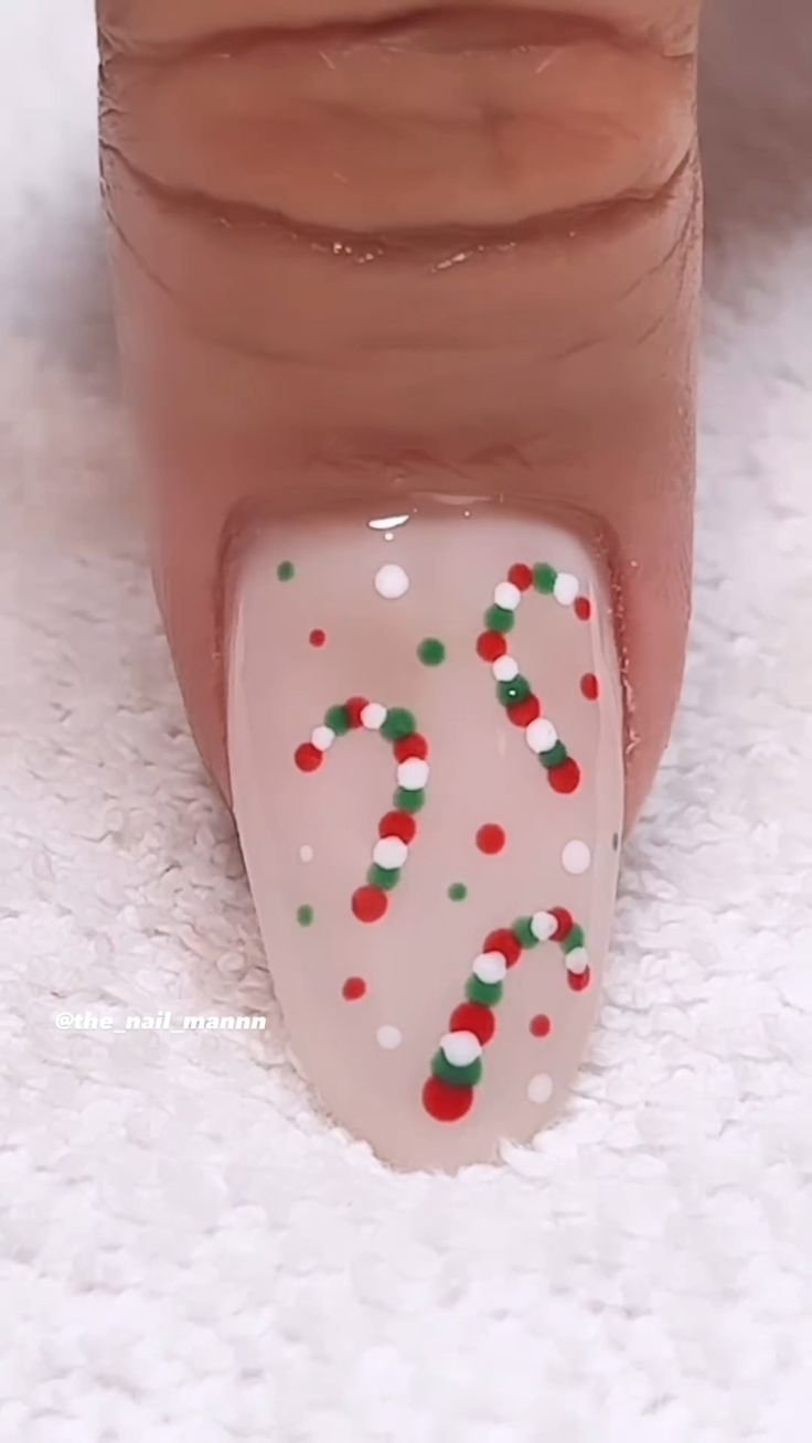 24 Glam Christmas Nail Designs That’ll Make You Shine Bright This Season! - 5. Candy Cane Twist 1