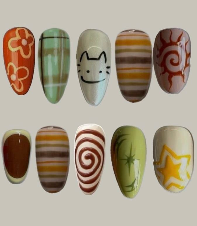 28 Stunning Boho Christmas Nails You Need to Try This Holiday Season (Number 7 Is a Showstopper!) - 2. Earthy Tones with Leaf Accents 1