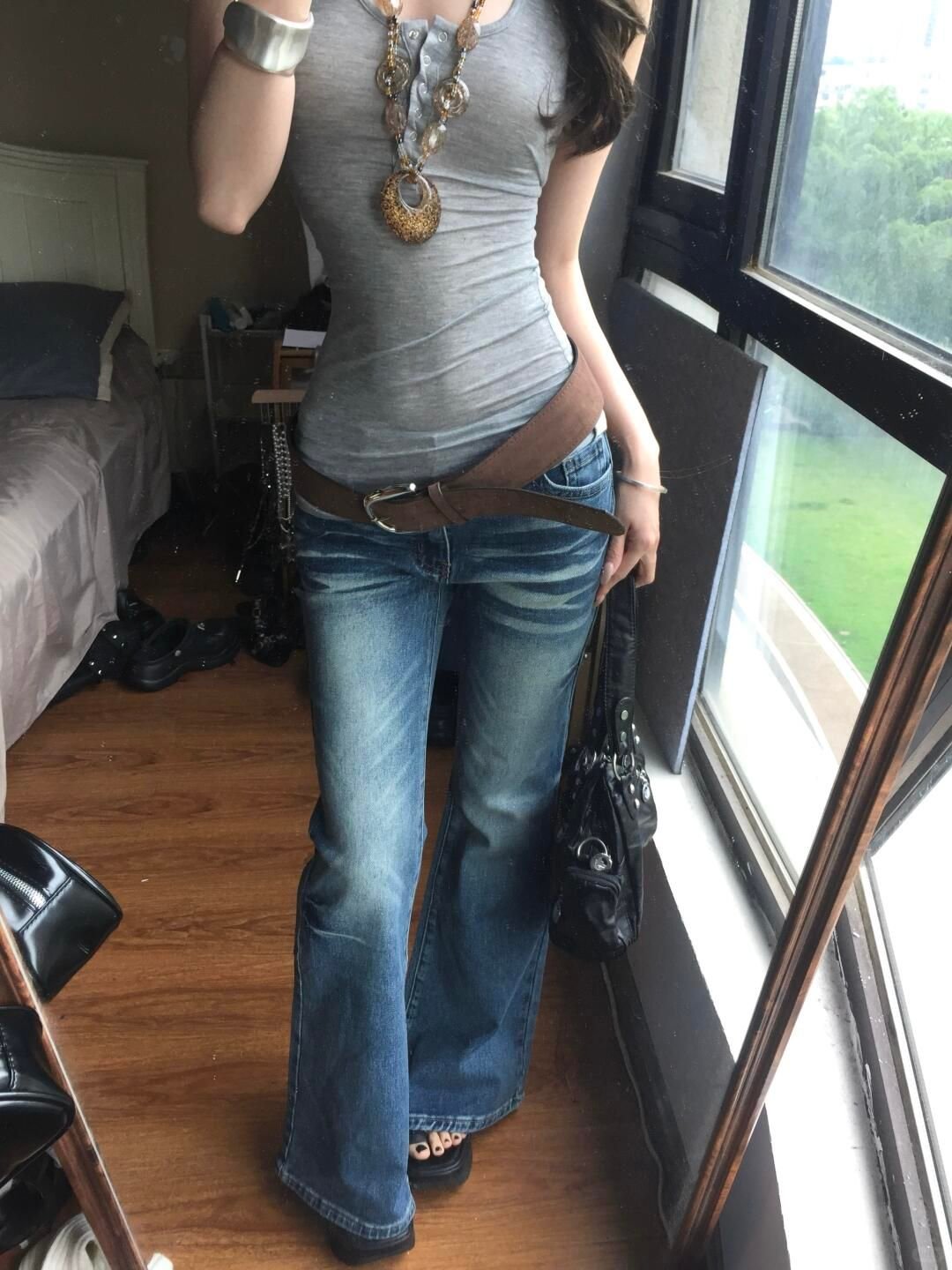 Tips for Styling Flare Jeans Outfits this Fall: Look Chic and Cozy! - 6. Play with Accessories 1